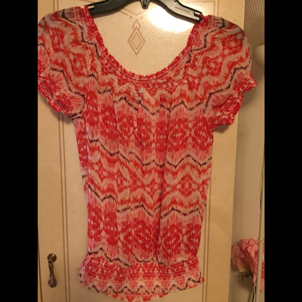 Brightly colored sheer short sleeve top